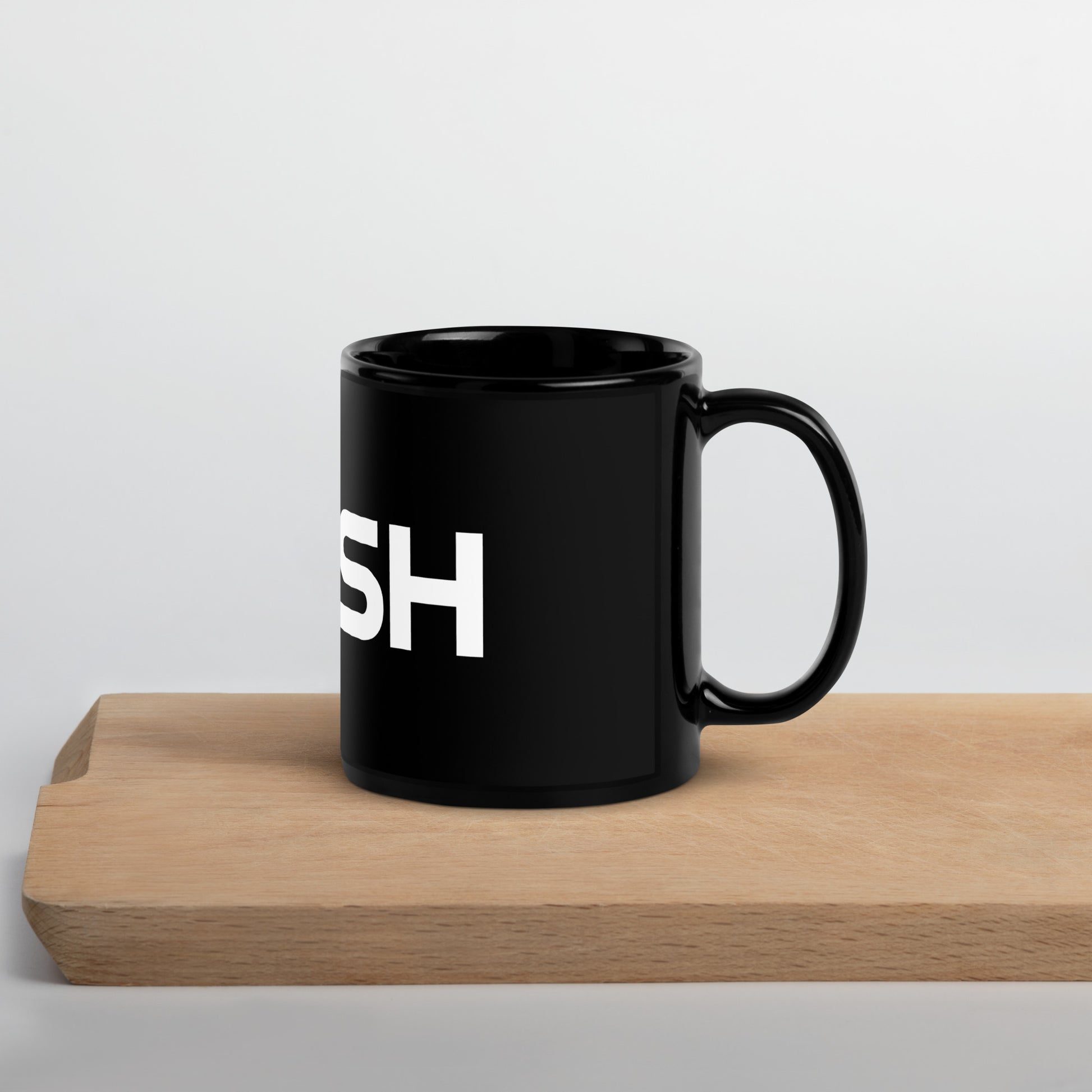 side view of black glossy 11oz mug with the handle on the right