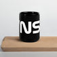 front view of black glossy 15oz mug with white VNSH logo